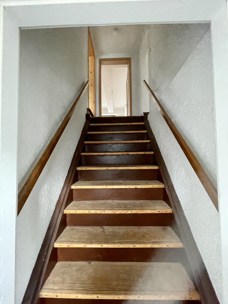 Treppe in die oberen Räume